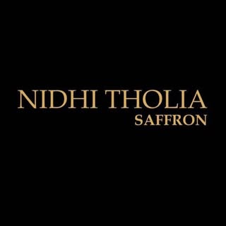 Nidhi Tholia